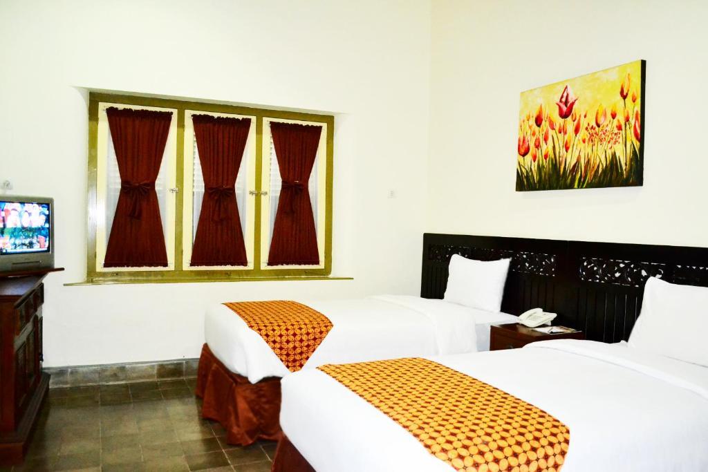 The Kresna Hotel Yogyakarta Rom bilde